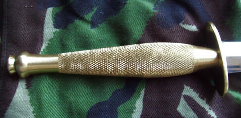 Knurled brass handle